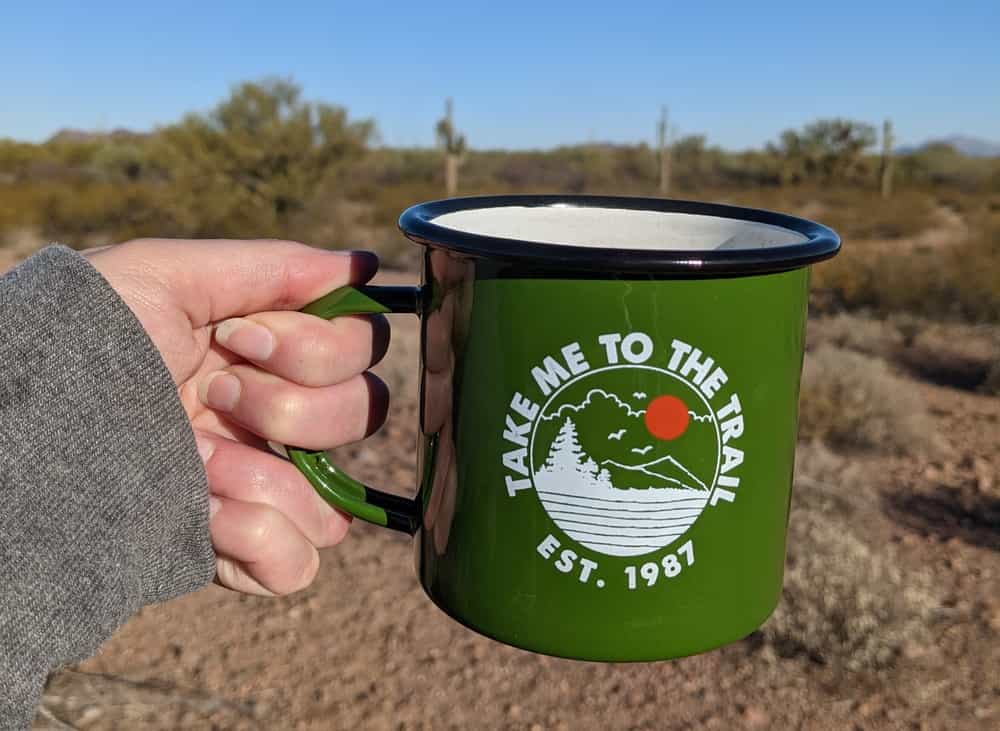 Talk To Us (Before We Go Off-Grid Again) 1 making coffee with the best french press for camping. green mug that says take me to the trail.