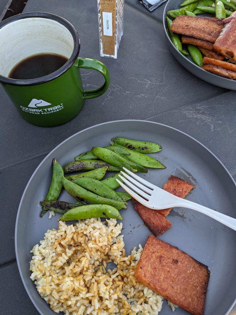 plate of rice, green beans, and coffee made with the best camping french press