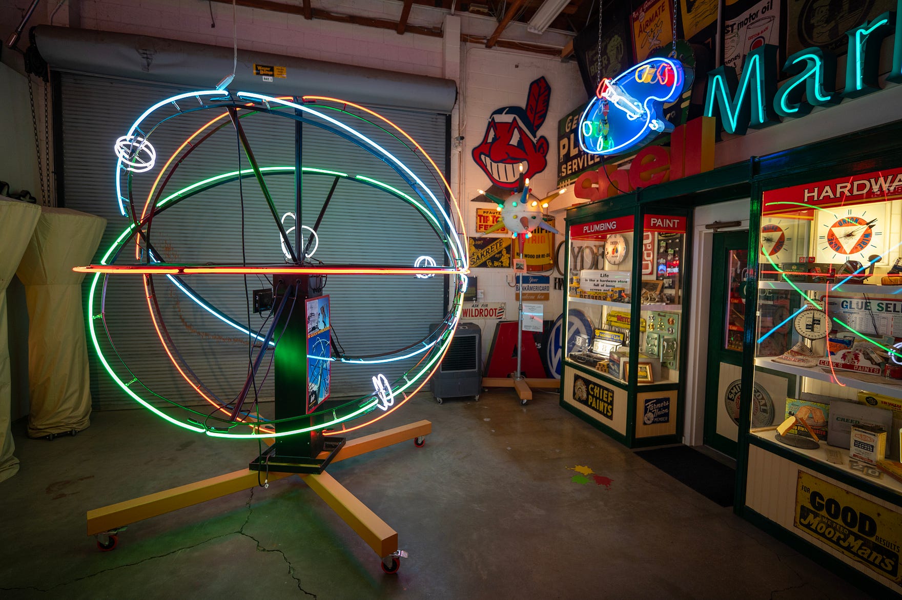 neon sign in the shape of an atom
